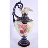 Royal Worcester ewer shape 1309 painted with flowers on an ivory ground, the handle, neck and base p