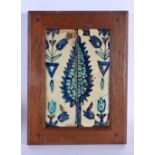 AN ANTIQUE MIDDLE EASTERN TURKISH FAIENCE TILE painted with floral motifs. 30 cm x 24 cm.