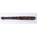 AN ANTIQUE CARVED WOOD PAINTED TRUNCHEON. 40 cm long.