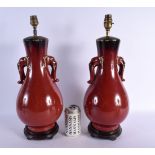 A PAIR OF EARLY 20TH CENTURY CHINESE TWIN HANDLED FLAMBE LAMPS Late Qing/Republic. 45 cm x 15 cm.