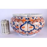 A LARGE 19TH CENTURY JAPANESE MEIJI PERIOD LOBED IMARI PLANTER painted with foliage. 25 cm x 18 cm.