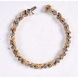 A 14CT GOLD AND DIAMOND BRACELET. 19 grams. 19 cm long.