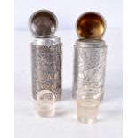 TWO VICTORIAN SILVER SCENT BOTTLES by Samson Morden. London 1885 & Birmingham 1897. 109 grams. 5.5 c