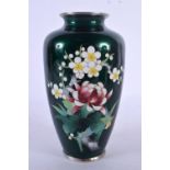 A JAPANESE TAISHO PERIOD GREEN GROUND CLOISONNE ENAMEL VASE. 18 cm high.