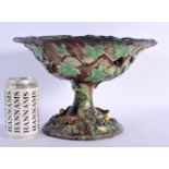 A LARGE 19TH CENTURY PORTUGUESE MAJOLICA PEDESTAL COMPORT Attributed to Palissy, decorated all over