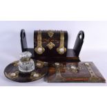 A FINE MID 19TH CENTURY ENGLISH CARVED COROMANDEL AND ORMOLU DESK SET inset with enamelled roundels.