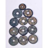 A collection of Chinese tokens (12).