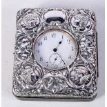 AN EDWARDIAN SILVER MOUNTED DESK CLOCK. Birmingham 1910. 9.5 cm square.