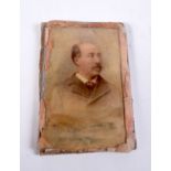 A small reverse painted portrait on glass of a gentleman 9.5 cm .