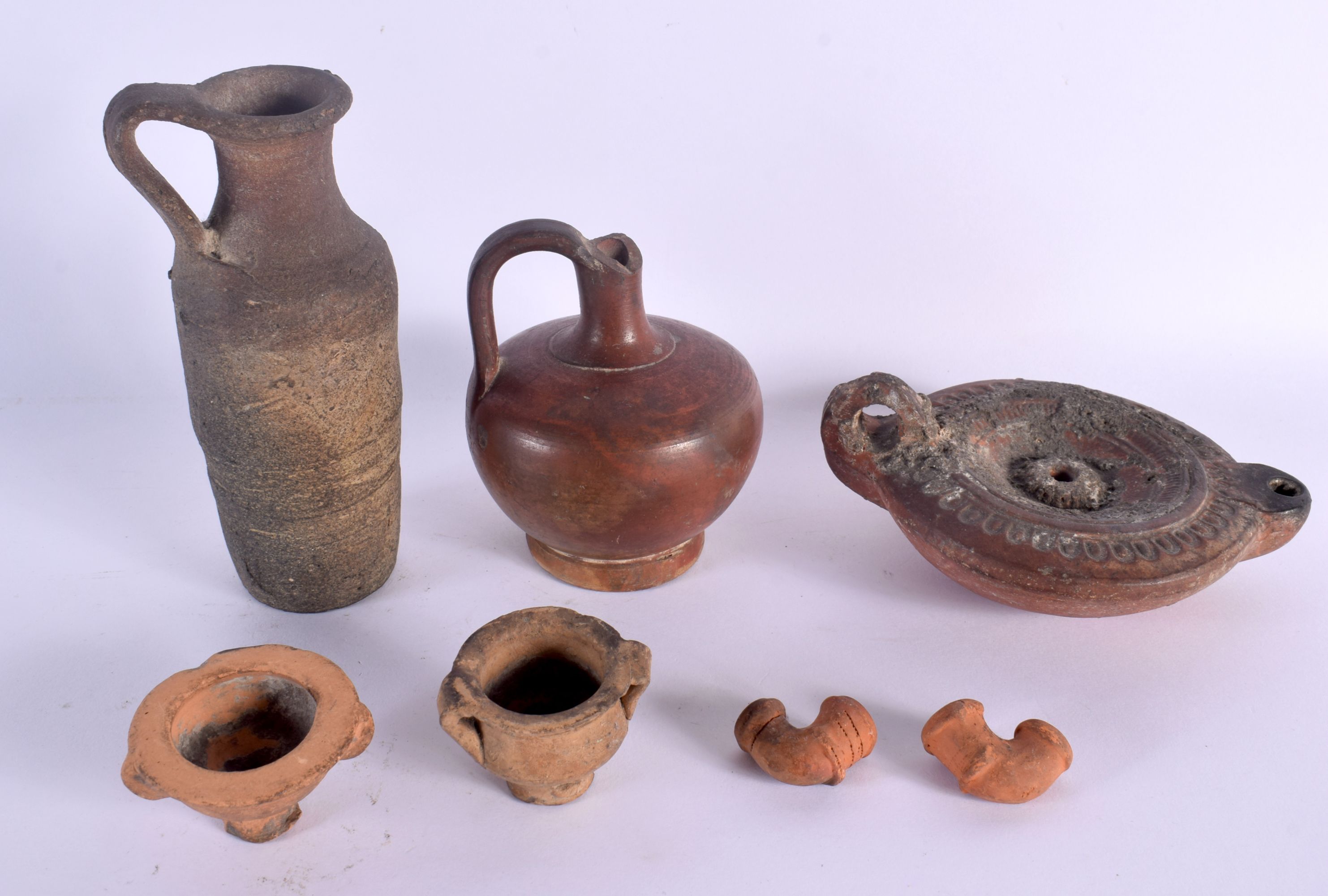 A GROUP OF ANTIQUITIES in various forms and sizes. Largest 11 cm wide. (7) - Image 2 of 2