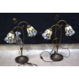 A pair of Tiffany style lamps 72 x 52 cm (2).