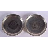 TWO CHINESE WHITE METAL COIN DISHES 20th Century. 221 grams. 9 cm diameter.