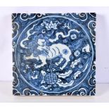 A Chinese blue and white Temple tile decorated with a Lion 3 x 20 x 20 cm.