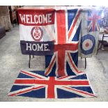 Two vintage Union Jacks, together with a RAF Ensign and a welcome home flag 176 x 90 cm.