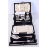 A SILVER AND MOTHER OF PEARL CONDIMENT SET together with a cased silver fork and spoon. Birmingham 1