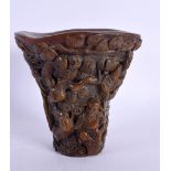 A CHINESE CARVED BUFFALO HORN TYPE LIBATION CUP 20th Century. 873 grams. 14 cm x 11 cm.