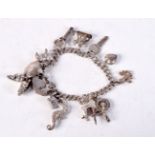 A SILVER CHARM BRACELET. Birmingham 1954. 37 grams. 18 cm long.