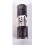 A VINTAGE WHITE METAL CYLINDRICAL WATCH. 8 cm x 2 cm extended.