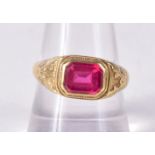 AN 18CT GOLD GEM SET RING. 4.7 grams. Q.