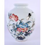 A CHINESE REPUBLICAN PERIOD FAMILLE ROSE VASE painted with flowers. 14 cm x 7 cm.