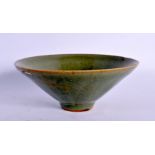 AN EARLY CHINESE KOREAN CELADON GLAZED CONICAL FORM BOWL. 14 cm diameter.