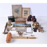 A miscellaneous collection including vintage desk bells, cane handles, binoculars, photographs etc (