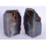 A PAIR OF CARVED AGATE BOOK ENDS. 17 cm x 12 cm.