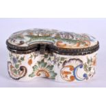 AN 18TH/19TH CENTURY FRENCH FAIENCE TIN GLAZED BOX painted with figures dancing. 9 cm x 6.5 cm.