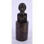 A 19TH CENTURY EUROPEAN GRAND TOUR BRONZE BUST OF HOMER upon a porphyry type base. 11 cm high.