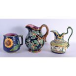 THREE LARGE MAJOLICA JUGS. Largest 25 cm x 18 cm. (3)