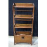 Arts and Crafts bookshelf with magazine rack base , possibly by Harris Lebus. 128 x 55 x 20cm.