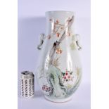 A LARGE CHINESE REPUBLICAN PERIOD TWIN HANDLED FAMILLE ROSE VASE painted with insects and flowers. 3