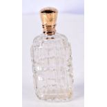 AN 18CT GOLD TOPPED SCENT BOTTLE. Indistinguishable marks, 8.8cm x 3.9cm x 2.4cm