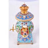 A CONTINENTAL SILVER AND ENAMEL MINIATURE SAMOVAR. Stamped 84, 10.7cm x 6.1cm, weight 154g