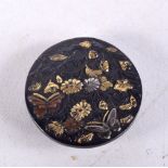 A 19TH CENTURY JAPANESE MEIJI PERIOD MIXED METAL BUTTON. 9 grams. 2.25 cm wide.
