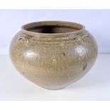 A large Korean glazed pottery bowl 24 x 33 cm.