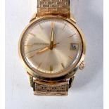 A 14CT GOLD ACCUTRON WRISTWATCH. 61 grams. 3.4 cm wide inc crown.