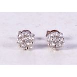 A PAIR OF 18CT GOLD DIAMOND CLUSTER EARRINGS. 2.1 grams. 0.6 cm wide.