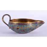 A RARE 18TH/19TH CENTURY INDIAN ISLAMIC MIDDLE EASTERN BRONZE OIL BURNER enamelled all over with fol