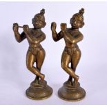A PAIR OF 17TH/18TH CENTURY INDIAN BRONZE FIGURES OF BUDDHISTIC DEITIES modelled as musicians. Large