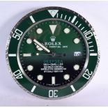 A ROLEX SHOP DISPLAY ADVERTISING WALL CLOCK. 33 cm diameter.