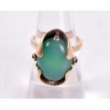 A 10K CHINESE GOLD AND JADE RING. 6 grams. L.