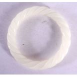 A CHINESE CARVED WHITE JADE TWIST BANGLE 20th Century. 6 cm diameter.