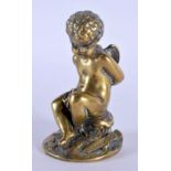 A 19TH CENTURY EUROPEAN BRONZE FIGURE OF A SEATED PUTTI modelled with hands tied. 9 cm x 4 cm.