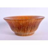 A CHINESE CARVED BUFFALO HORN TYPE LIBATION CUP 20th Century. 226 grams. 11 cm diameter.