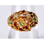 AN 18CT GOLD DIAMOND AND EMERALD TUTTI FRUITY RING. O. 5.8 grams.