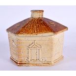 A RARE 19TH CENTURY ENGLISH SALT GLAZED BOX AND COVER formed as a house. 11 cm x 9 cm.