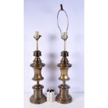A pair of heavy brass lampstands 62 cm (2)