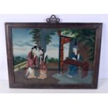 A framed Chinese reverse painted glass picture of two females 34 X 49 cm .