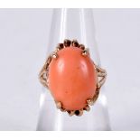 A 10CT GOLD AND CORAL RING. Stamped 10K, Size L. weight 4.9g